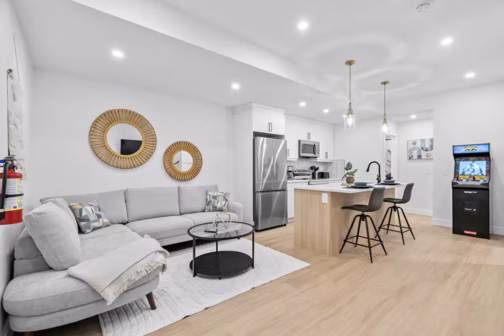 Suite living room open to its own kitchen at Tuxedo BnB